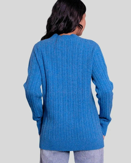 Woman in blue sweater and jeans modeling Cashmere Cable Pullover - Ultimate Luxury