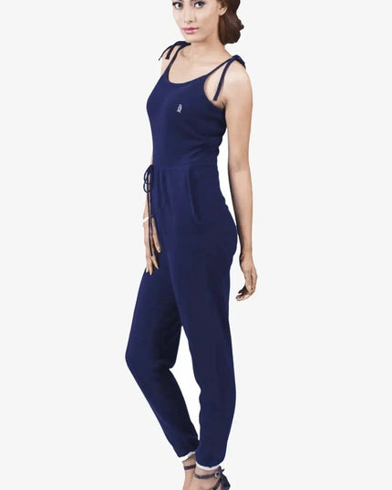 Woman in jumpsuit: Pure cashmere one-piece, classic design, black top and blue pants by ’Cashmere Camisole’