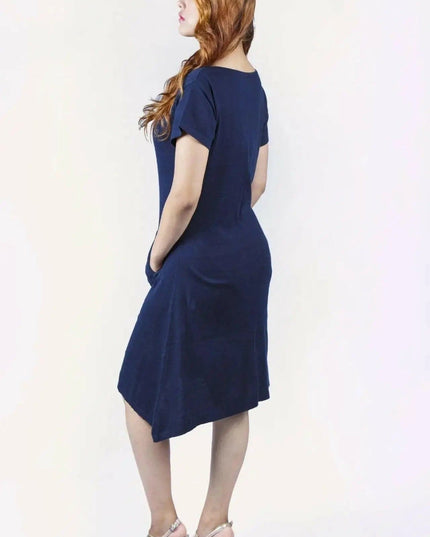 Woman in blue crew neck cashmere dress on white background
