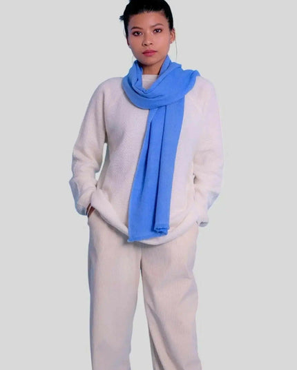 Italian Cashmere Basket Weave Scarf featuring woman in white sweater and blue scarf