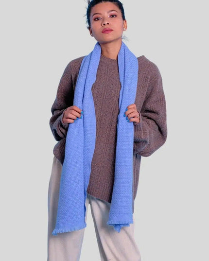 Italian Cashmere Basket Weave Scarf on a woman in blue scarf and brown sweater