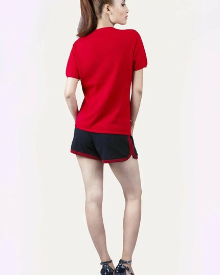 Italian Cashmere Turtle Neck T-Shirt with a flattering turtle neck worn by a woman in red shirt and black shorts