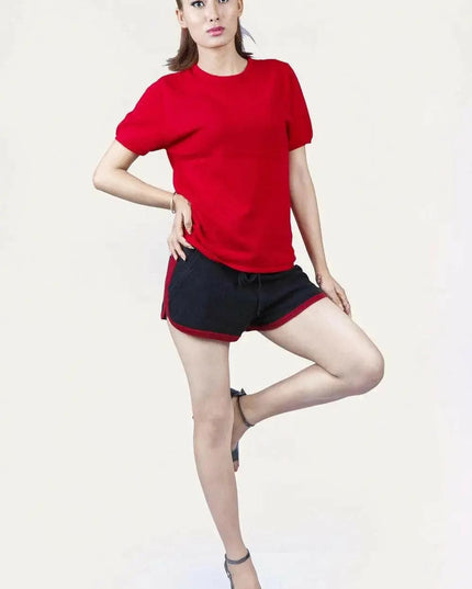 Italian Cashmere Turtle Neck T-Shirt featuring a woman in red shirt and black shorts