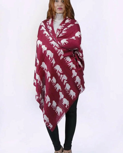 Woman wearing red and white cashmere animal printed ponche named ’KCI 202’