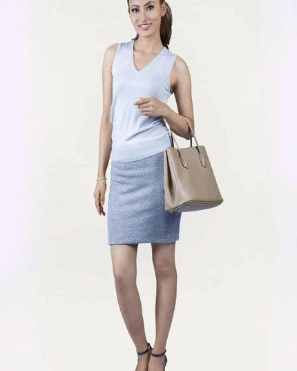 Woman in white top and blue skirt wearing KCI 233 cashmere skirt