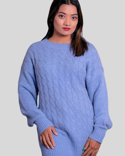 Woman in luxurious blue cashmere cable pullover