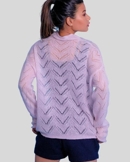 Luxurious cashmere silk pointelle pullover on woman in pink sweater