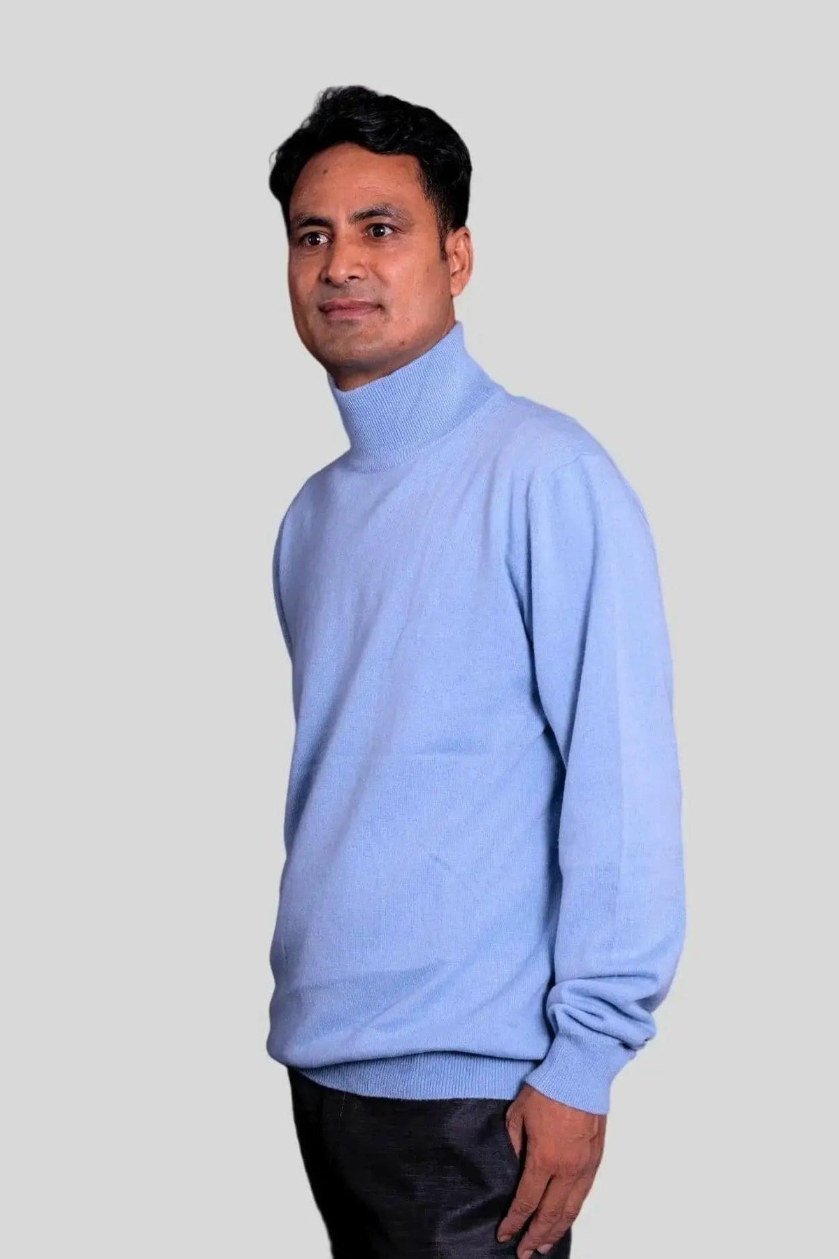 Blue men's cashmere turtleneck sweater on a white background