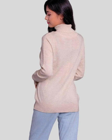 Woman showcasing luxurious Cashmere Turtleneck Pullover in pink sweater and jeans
