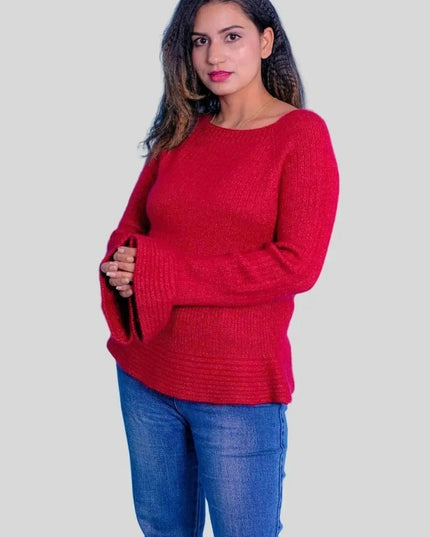 Woman in red sweater and jeans wearing Luxurious Cashmere Wider Cuff Pullover