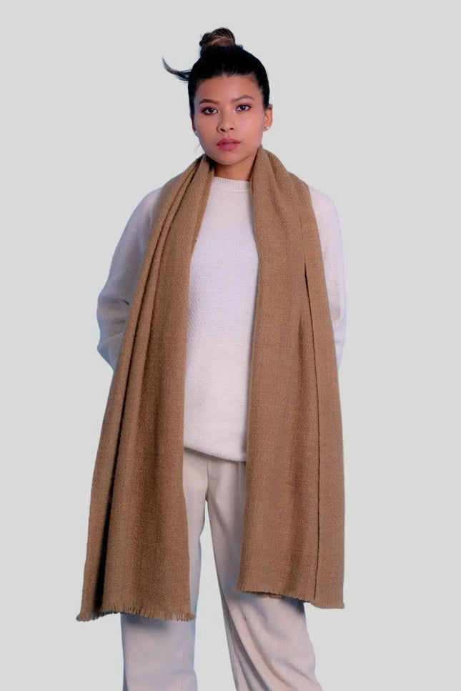 Woman wearing tan cashmere handspun scarf and white pants - Luxurious Italian Cashmere Handspun Scarf