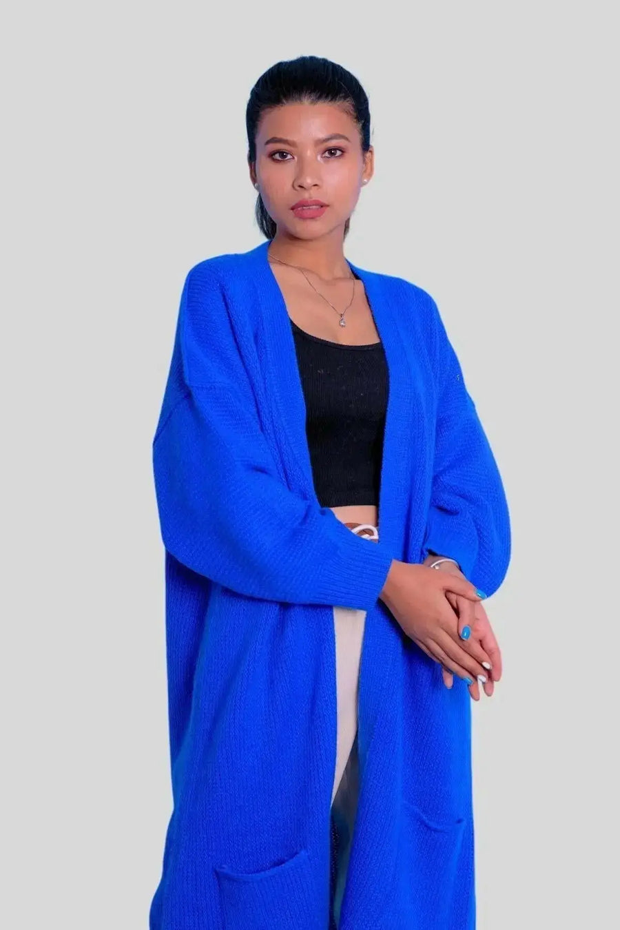 Luxurious Italian Cashmere Long Cardigan - Woman wearing blue cardigan sweater