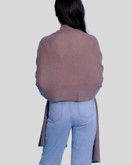 Woman in brown coat and blue jeans wearing Luxurious Italian Cashmere Scarf for winter wardrobe
