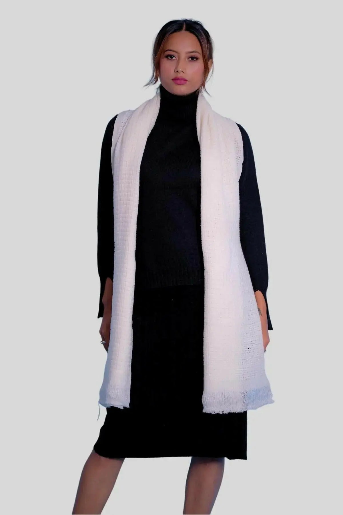 Luxurious Italian Cashmere Scarves featuring a woman wearing white vest and black dress