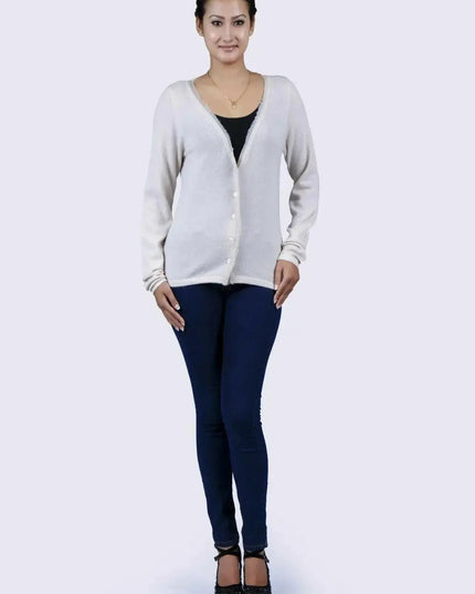 Woman in luxurious Italian cashmere V-neck sweater and jeans