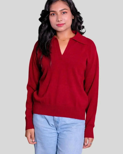 Stylish woman in red sweater and jeans, showcasing Luxurious Women’s Cashmere Polo