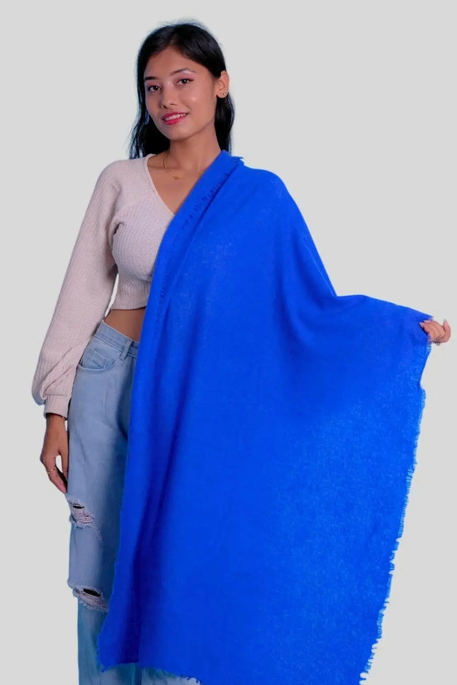 Woman holding blue cashmere felted scarf