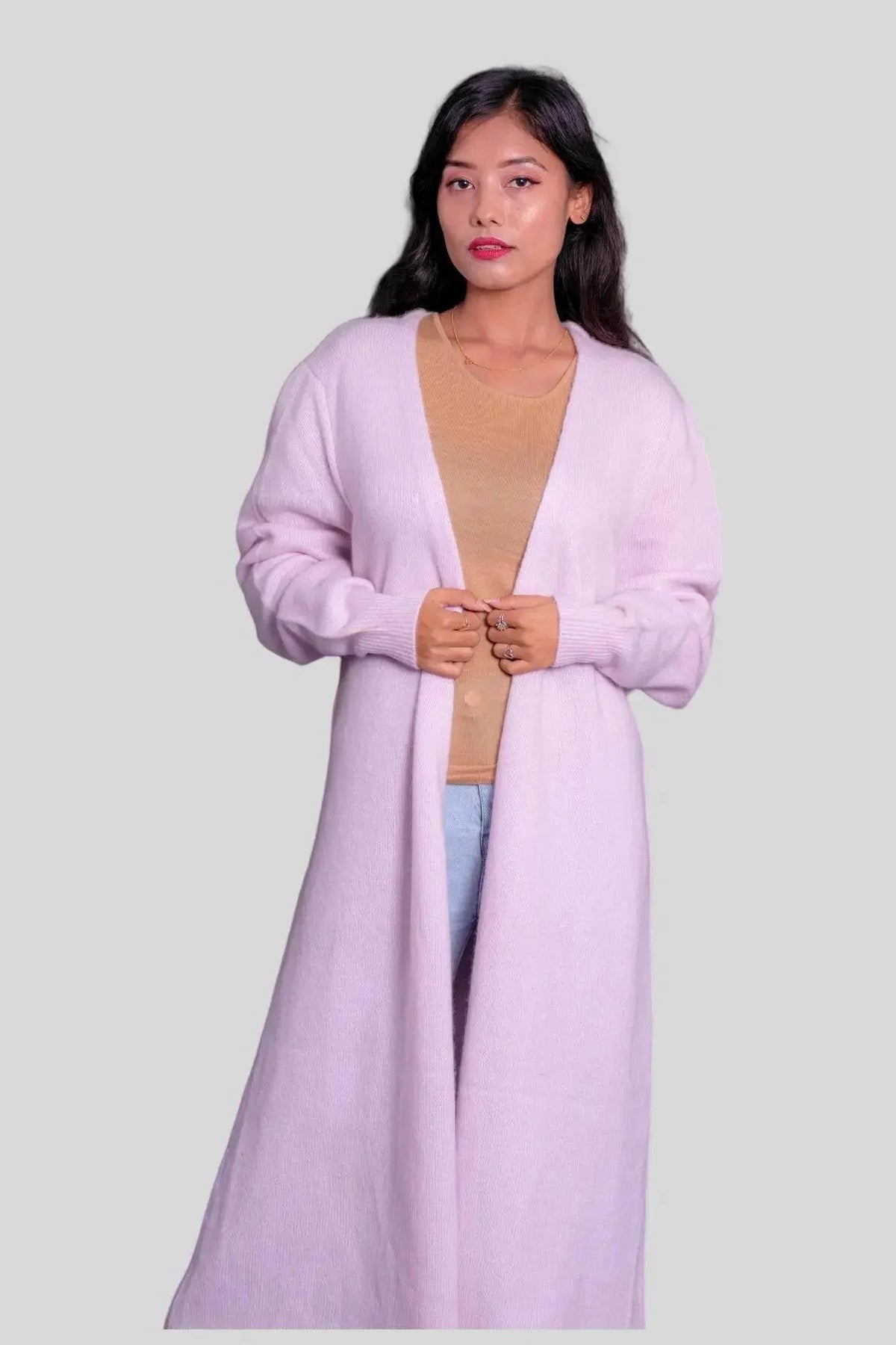 Pink Italian cashmere long cardigan styled on a woman