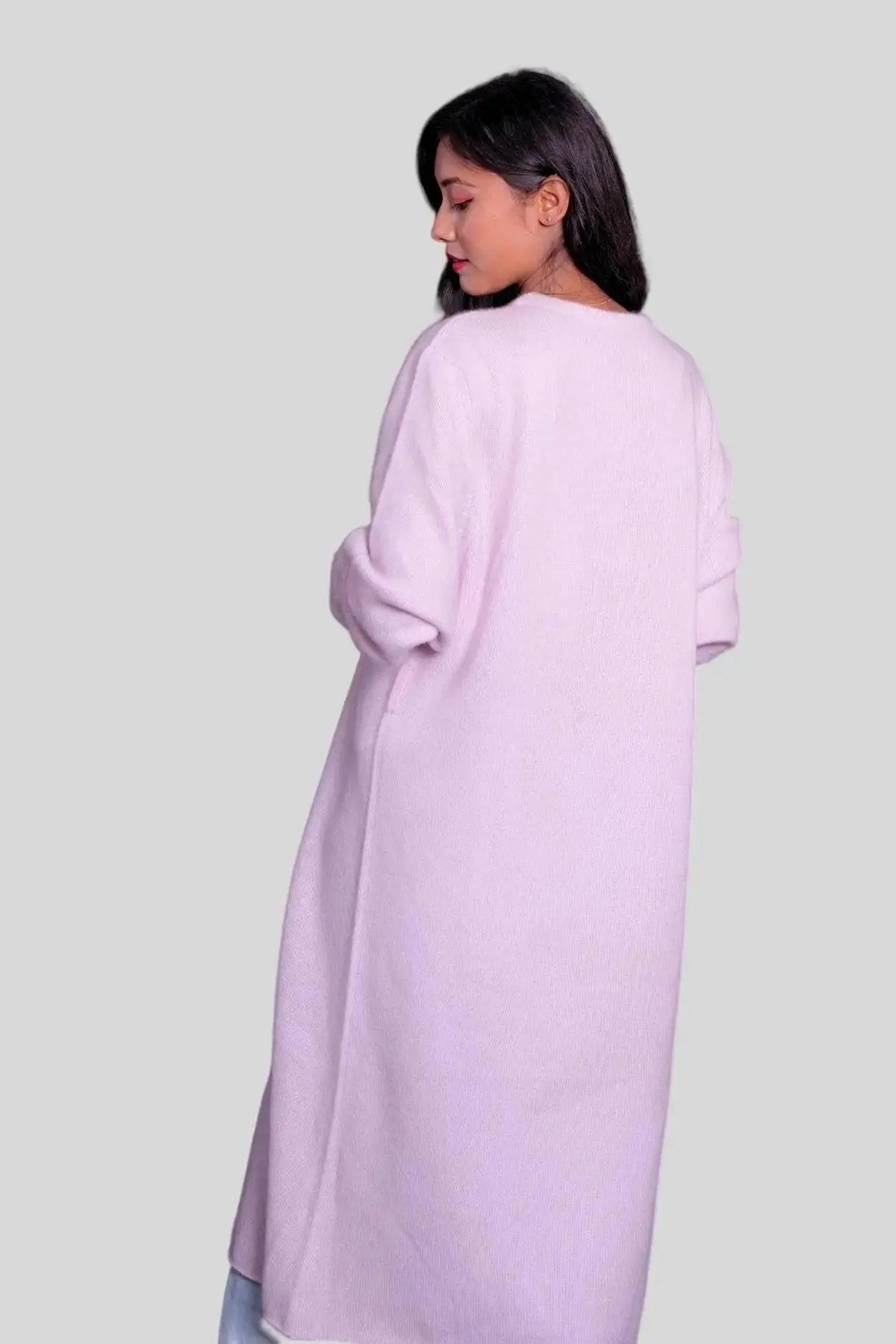 Woman modelling a pink Italian cashmere long cardigan
