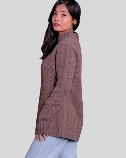Woman in brown cashmere cable pullover