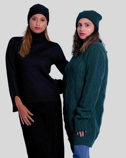 Two women in high-end cashmere dresses and hats standing together