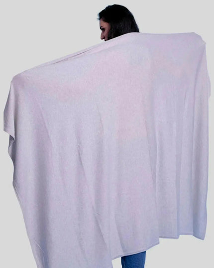 Luxury Italian Cashmere Throw: Woman wrapped in white blanket