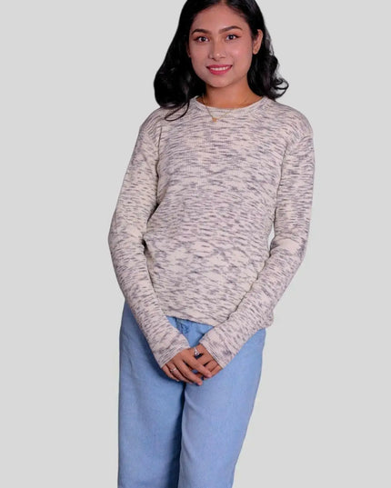 Soft Italian Cashmere Pullover - a girl in a white sweater and blue jeans