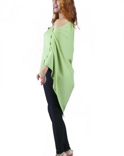 Woman wearing black pants and green sweater with Women’s cashmere poncho | KCI 246