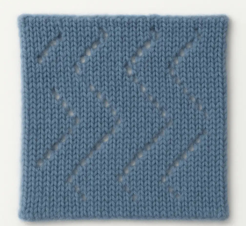 Swatch 25 light blue knitted italian cashmere fabric with textured diagonal diamond shade bands pattern