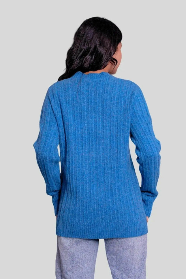 Woman in blue sweater and jeans modeling Cashmere Cable Pullover - Ultimate Luxury