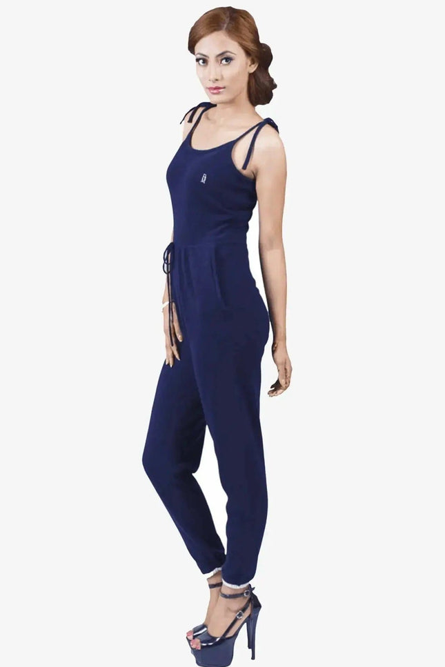 Woman in jumpsuit: Pure cashmere one-piece, classic design, black top and blue pants by ’Cashmere Camisole’
