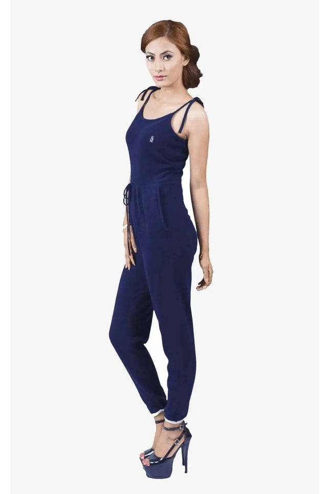 Woman in jumpsuit: Pure cashmere one-piece, classic design, black top and blue pants by ’Cashmere Camisole’