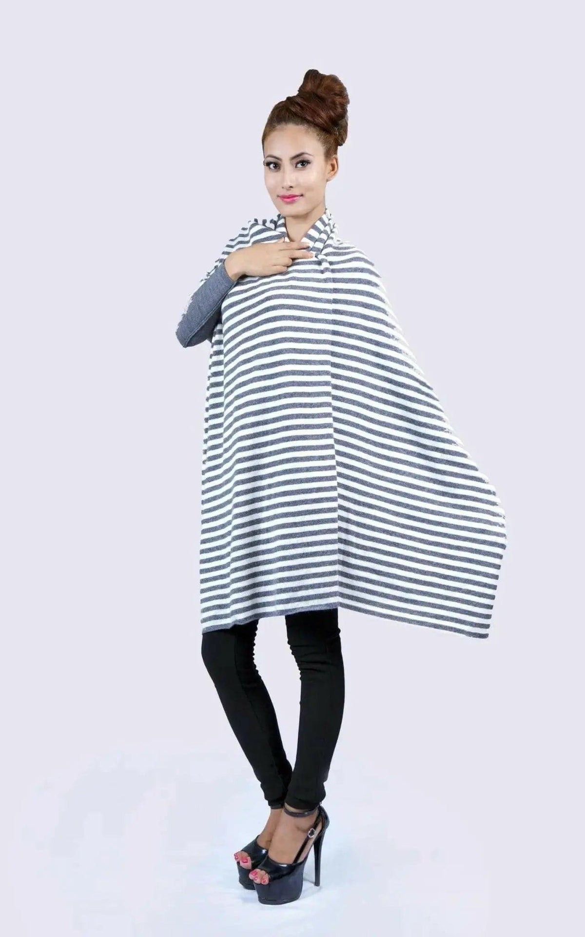 Cashmere Poncho (KCI 158) by Kanchan Cashmere: Woman wearing a striped poncho