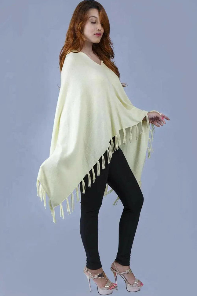 Woman wearing yellow cashmere poncho || KCI 249 by Kanchan Cashmere