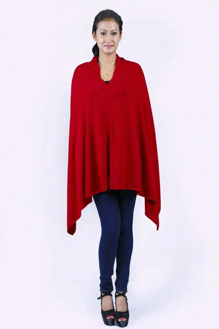Woman wearing a red cashmere poncho wrap (KCI 117)