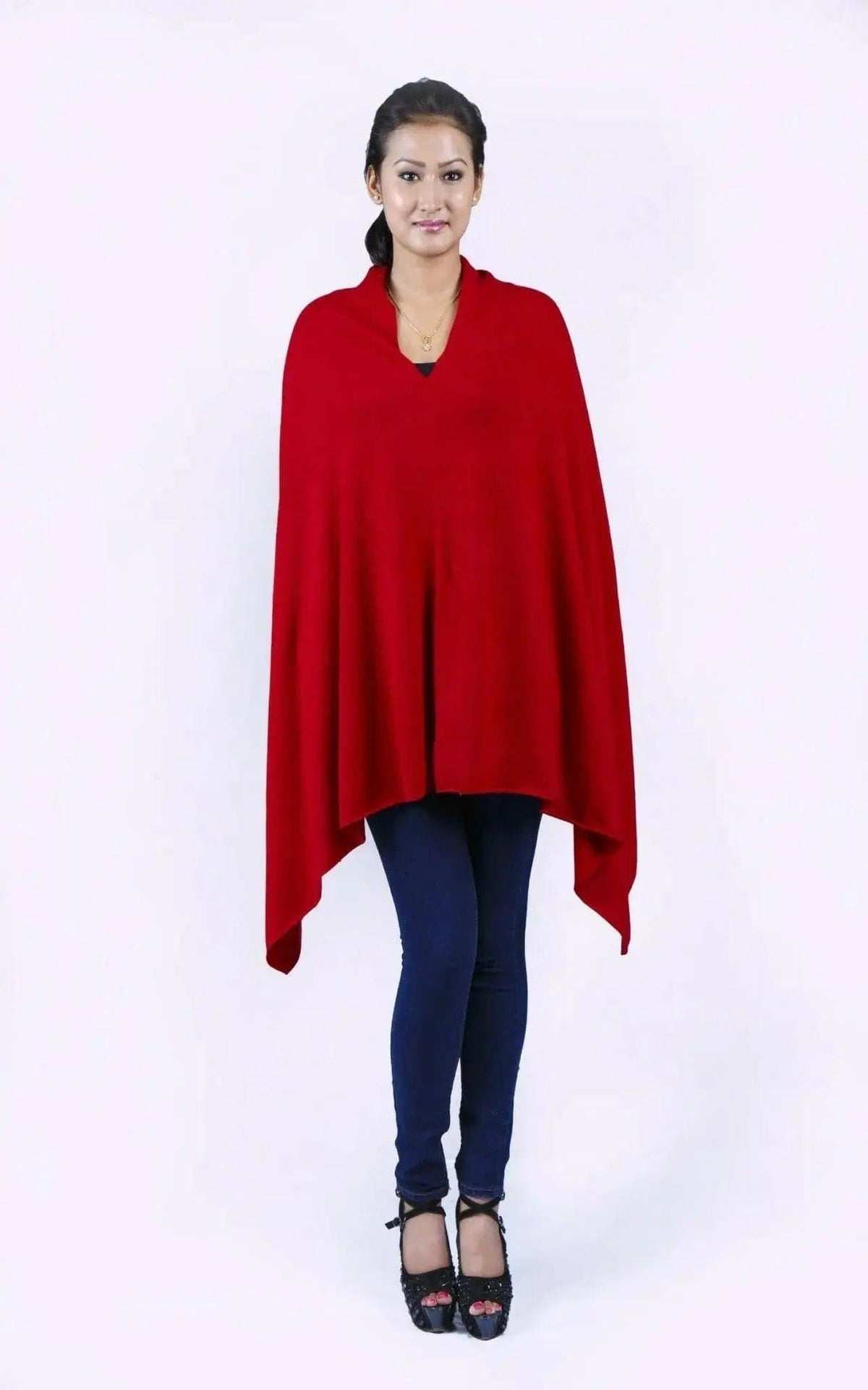 Woman wearing a red cashmere poncho wrap (KCI 117)