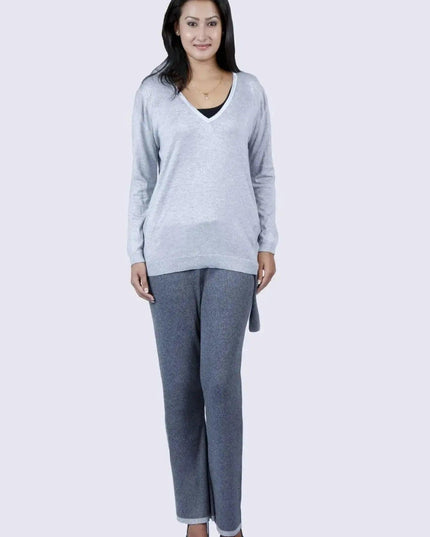 Woman in grey sweater and jeans – Cashmere Ribbed Trouser | KCI 109