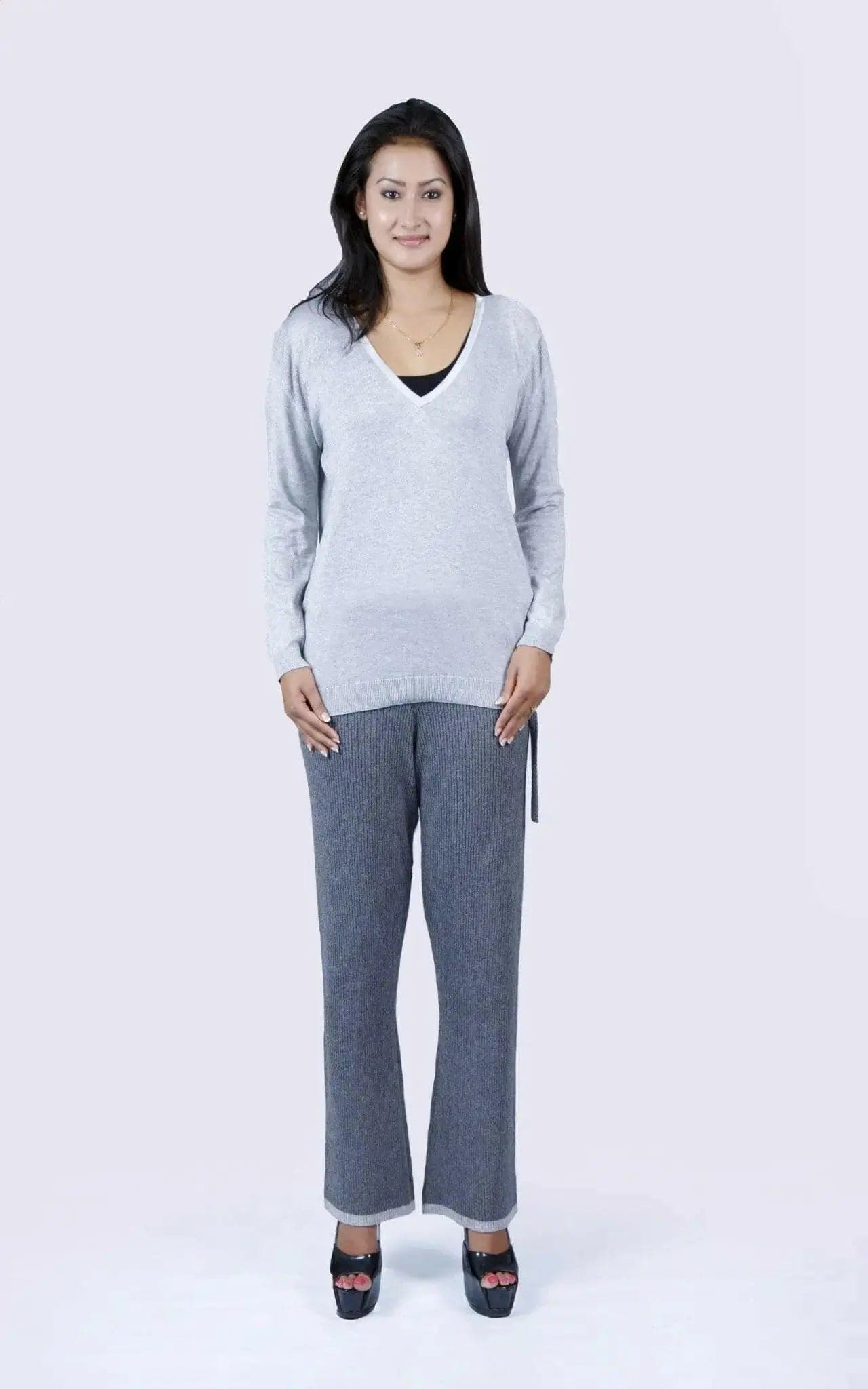 Cashmere Ribbed Trouser KCI 109: Woman in grey sweater and pants
