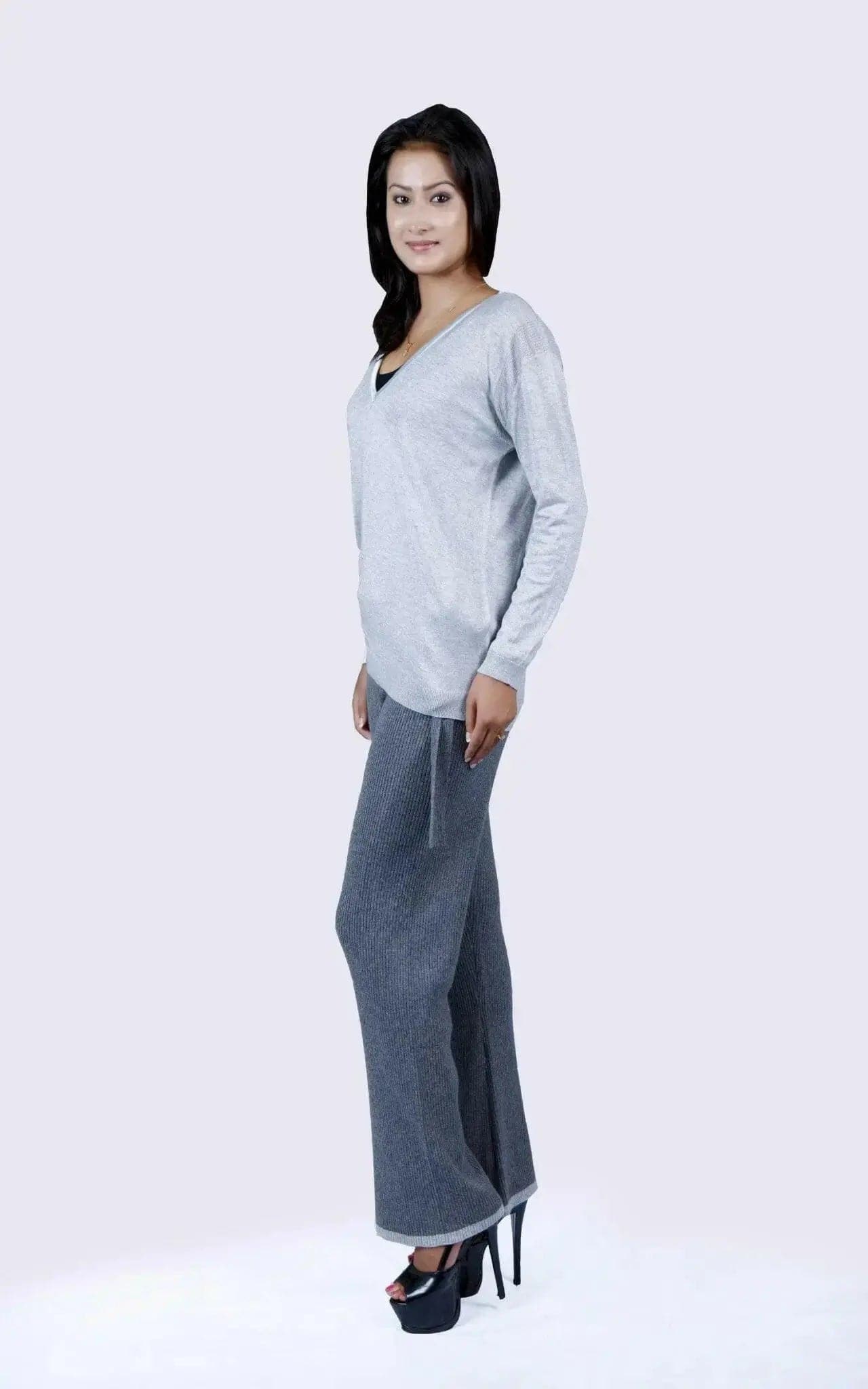 Cashmere ribbed trouser in gray styled by a woman