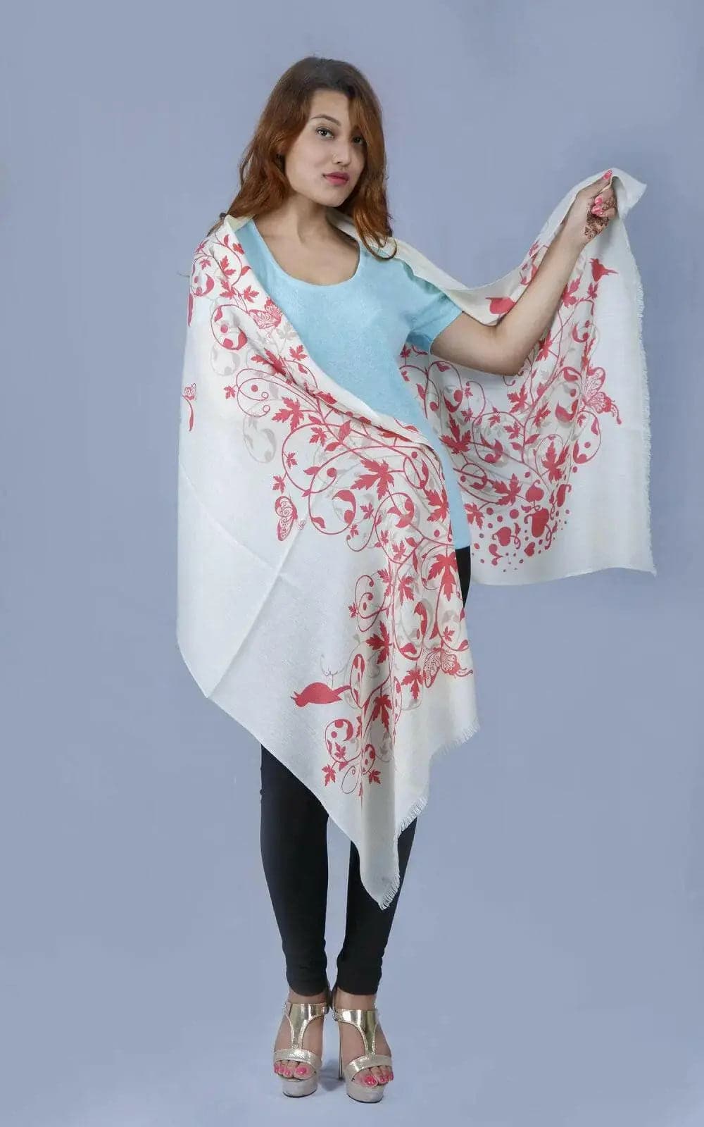 Woman wearing white and red floral print KCI 149 cashmere shawl by Kanchan Cashmere