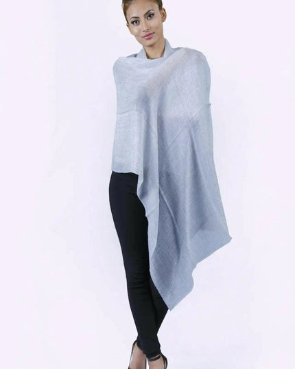 Cashmere Shawl by Kanchan Cashmere, woman in grey poncho and black top