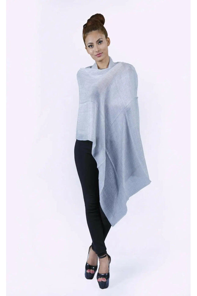 Cashmere Shawl by Kanchan Cashmere, woman in grey poncho and black top