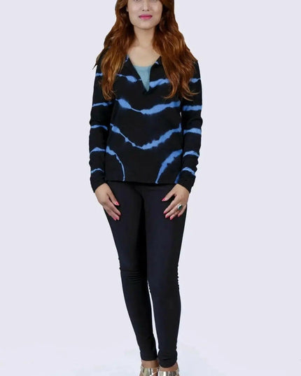 Woman wearing black sweater and jeans, showcasing Cashmere Sleeve Print Tunic Top