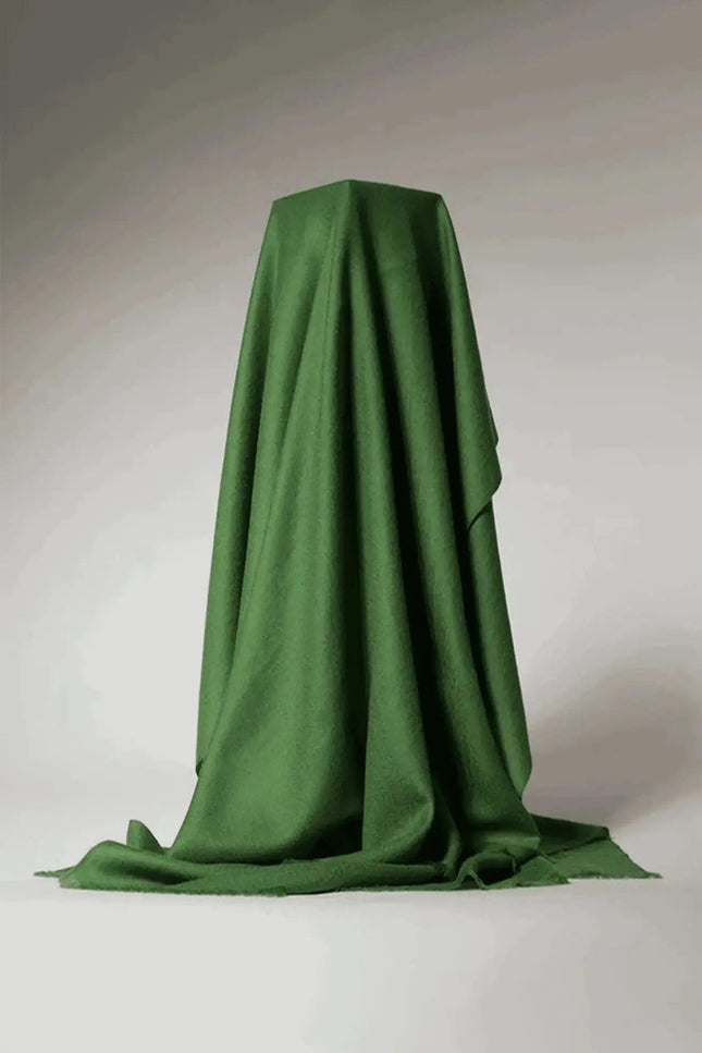 Cashmere throw blanket in green on white background | KCI 210