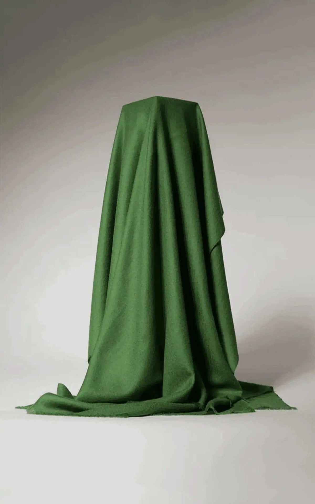 Cashmere throw blanket in green on white background | KCI 210