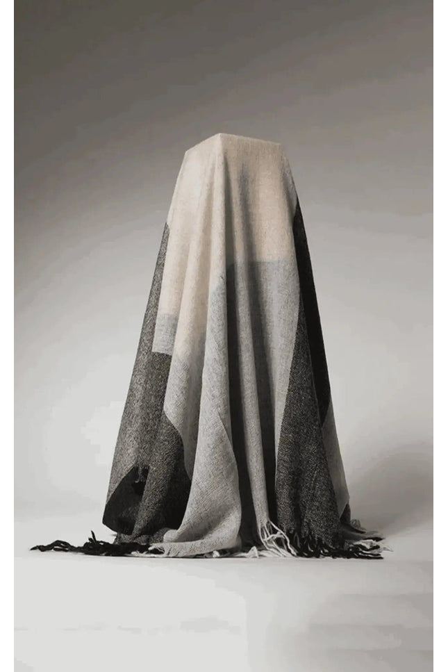 Cashmere Throw | KCI 150 on white surface with black and white background