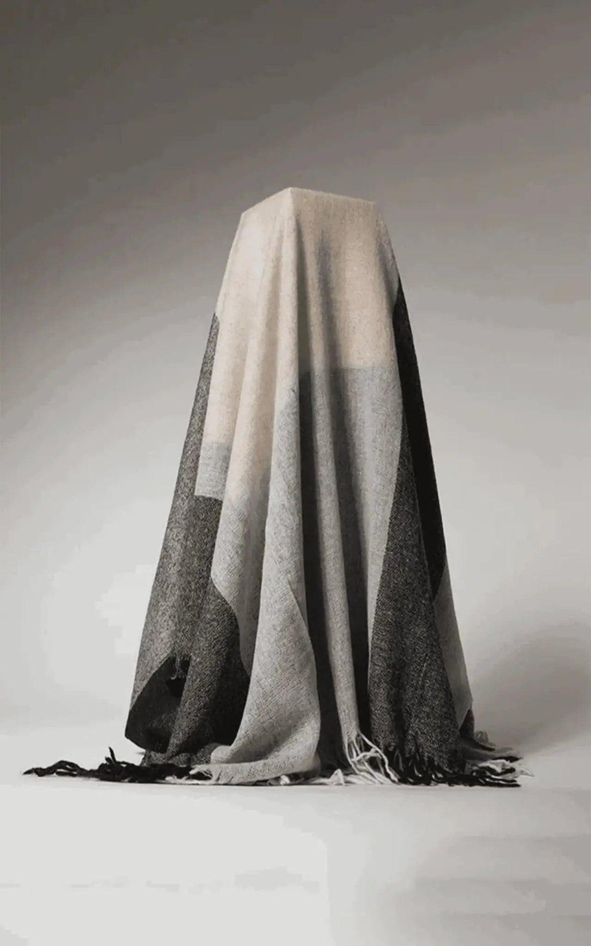 Cashmere Throw | KCI 150 on white surface with black and white background