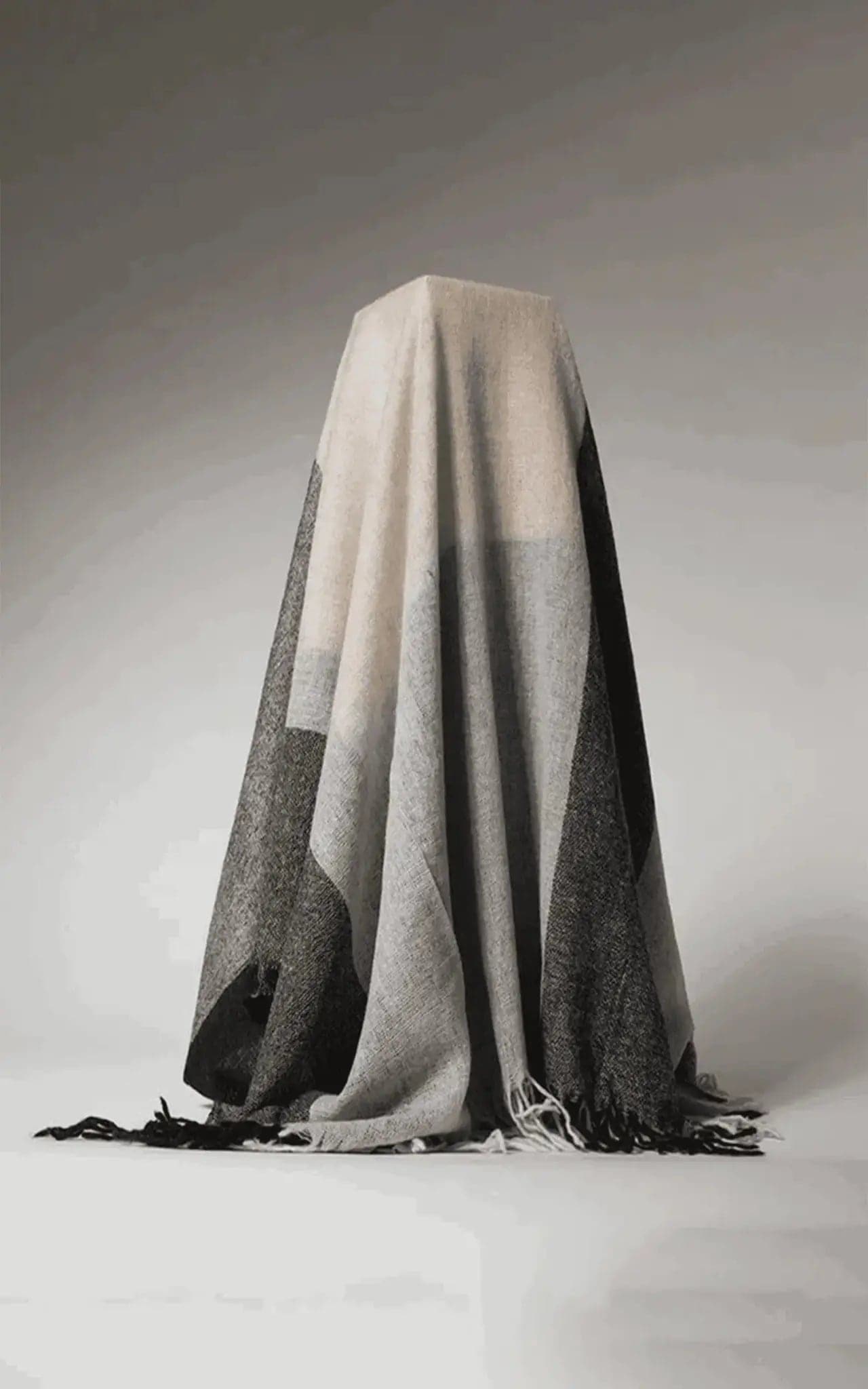 Cashmere Throw | KCI 150 on white surface with black and white background