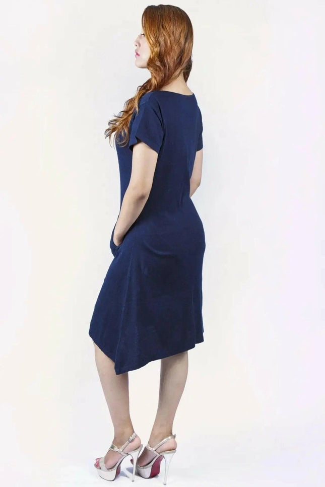 Woman in blue crew neck cashmere dress on white background