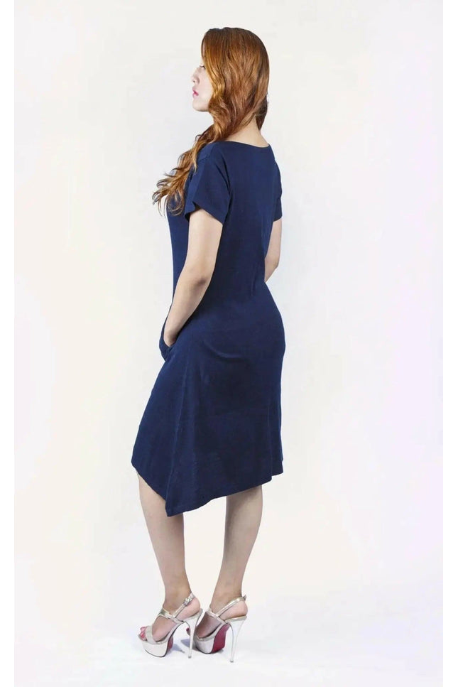 Woman in blue crew neck cashmere dress on white background